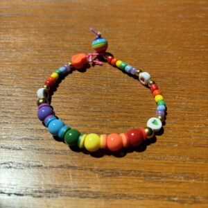 image of a rainbow beaded bracelet